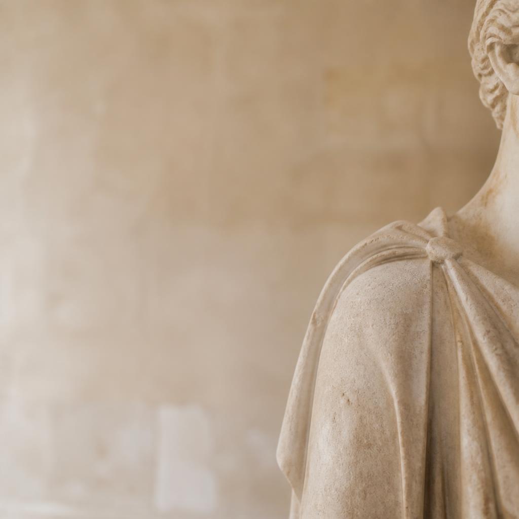 Detail of a classical carved stone figure